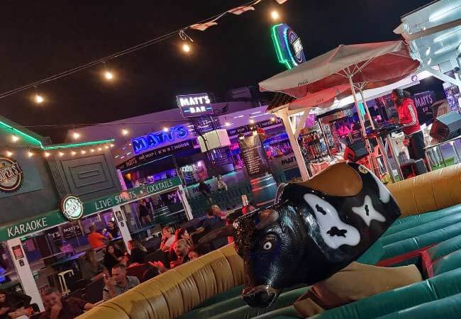 Bull ride bar entertainment on the Albufeira Strip near Oura