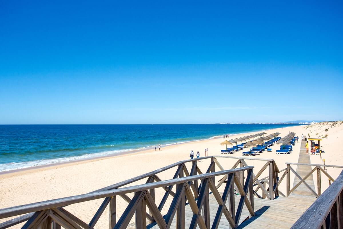 The exclusive soft golden sand beach and rolling dunes at Quinta do Lago resort